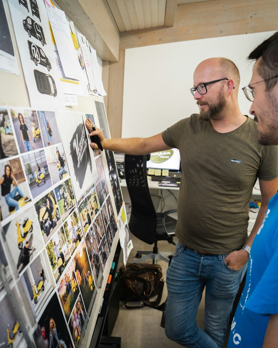 Team of broadcast professionals working together in a control room